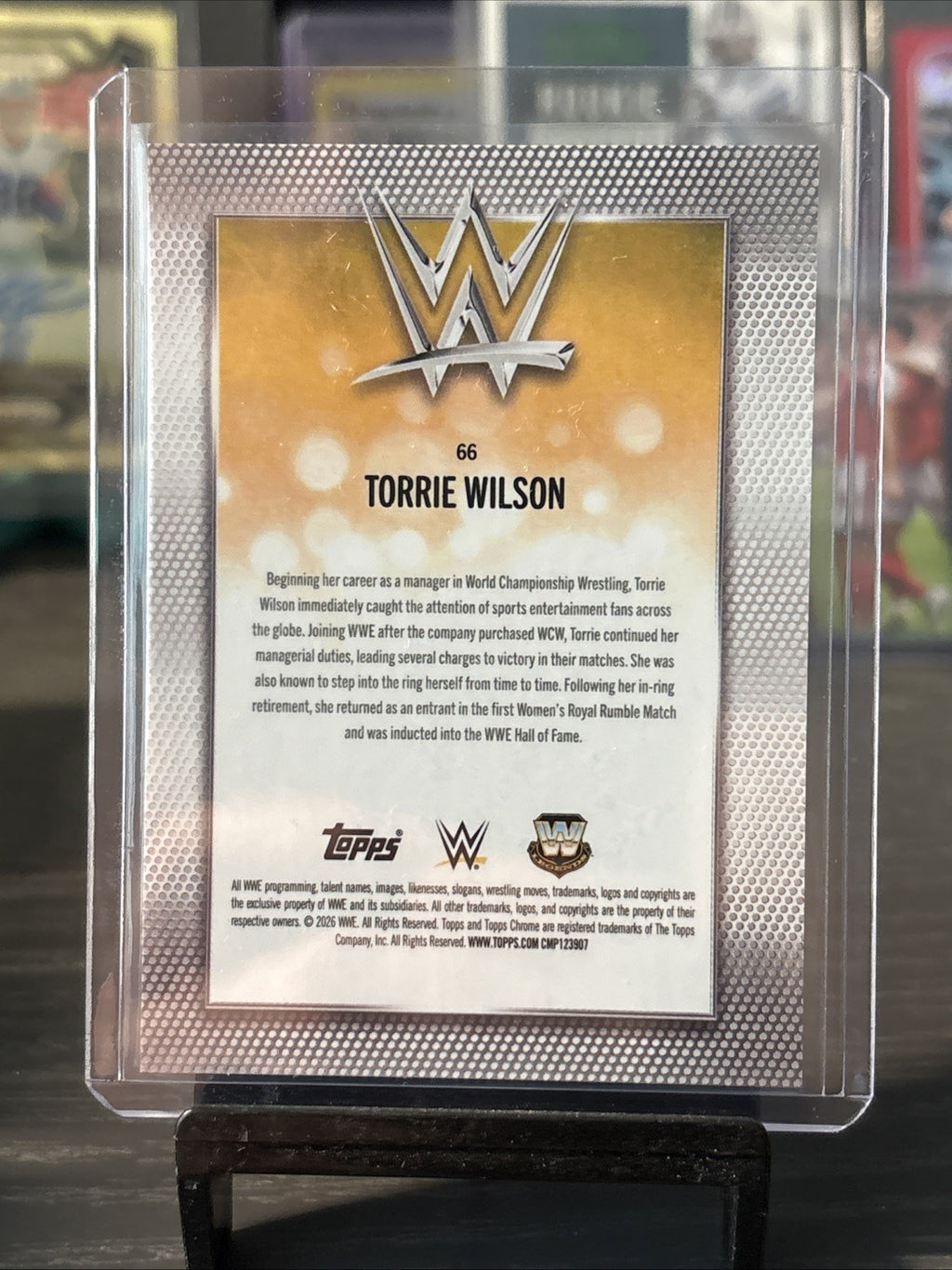 Torrie Wilson 2026 Topps Chrome WWE #66 Orange Sapphire Refractor /25